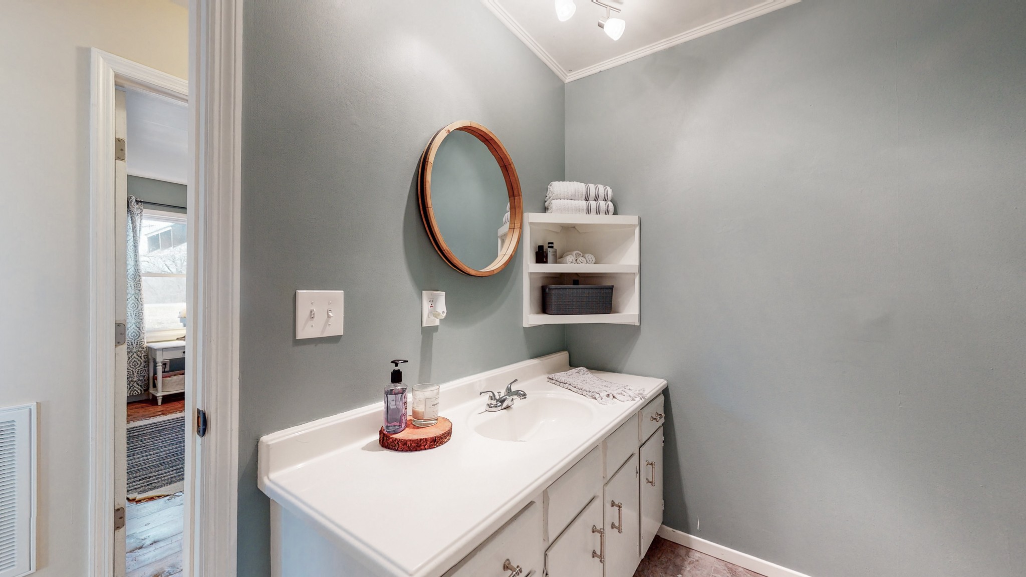 2615 Baugh Road Thompson's Station, TN 37179 - Photo 16 of 60 a bathroom with a sink and a mirror
