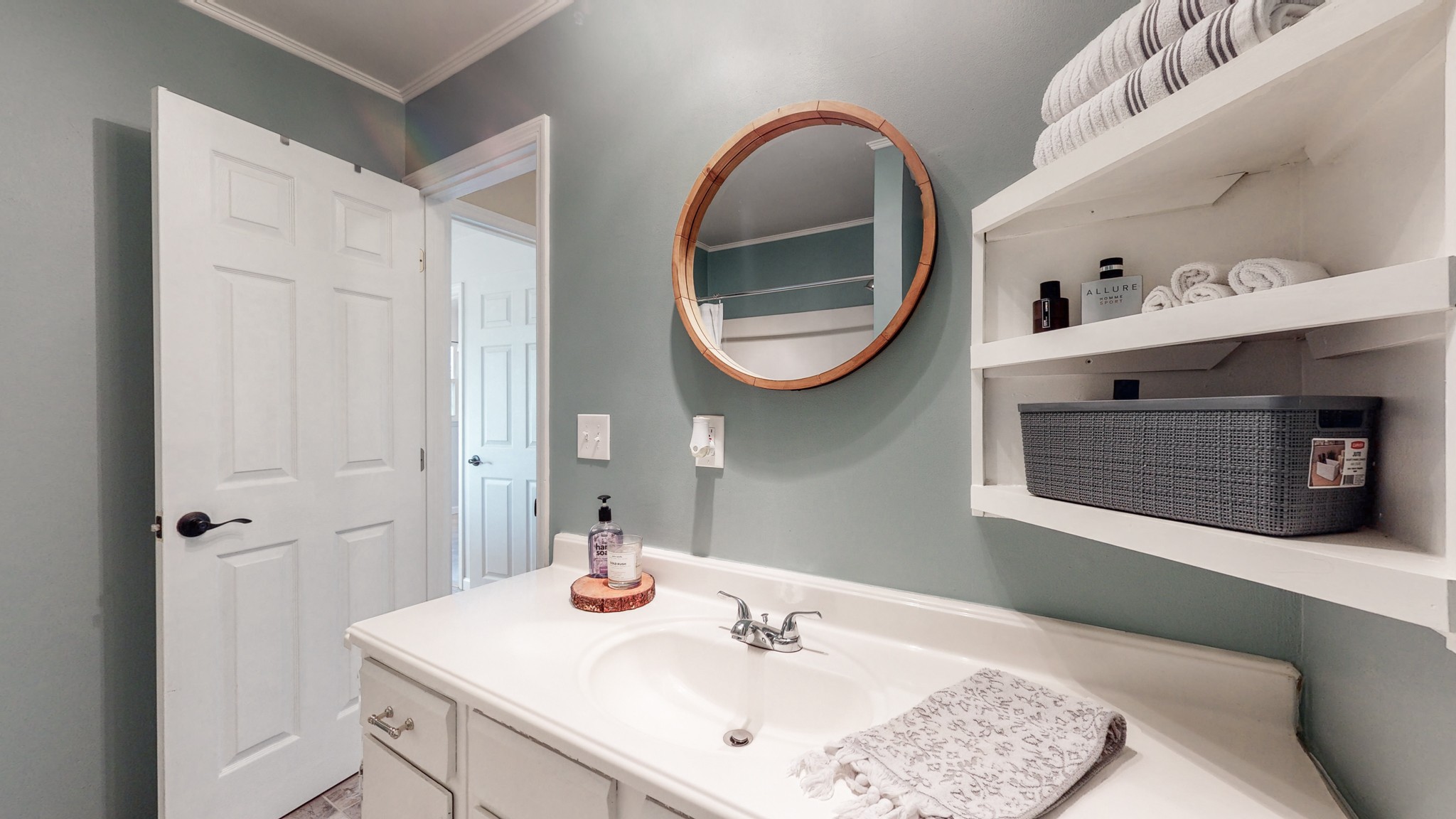 2615 Baugh Road Thompson's Station, TN 37179 - Photo 17 of 60 a bathroom with a sink and a mirror