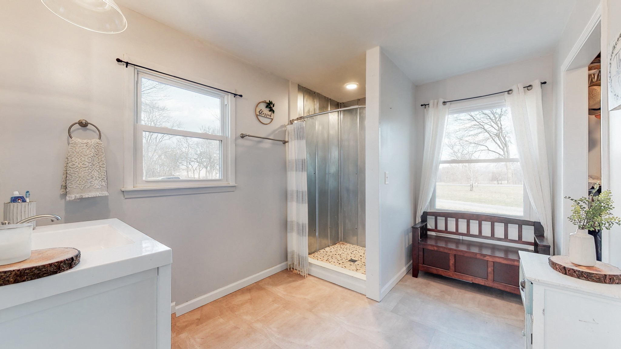 2615 Baugh Road Thompson's Station, TN 37179 - Photo 21 of 60 a spacious bedroom with a bed and a table chair