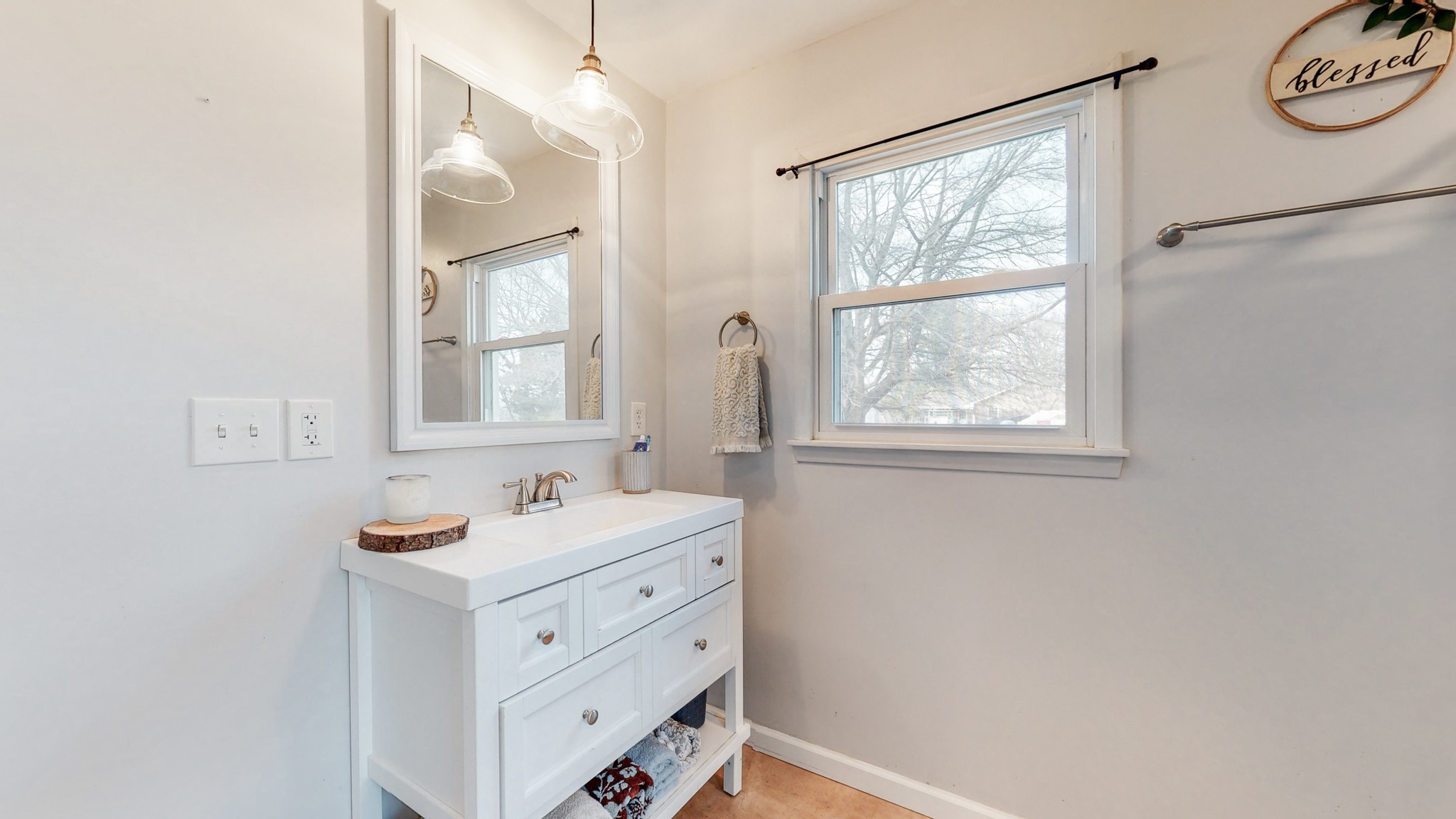 2615 Baugh Road Thompson's Station, TN 37179 - Photo 22 of 60 a bathroom with a sink vanity and a mirror