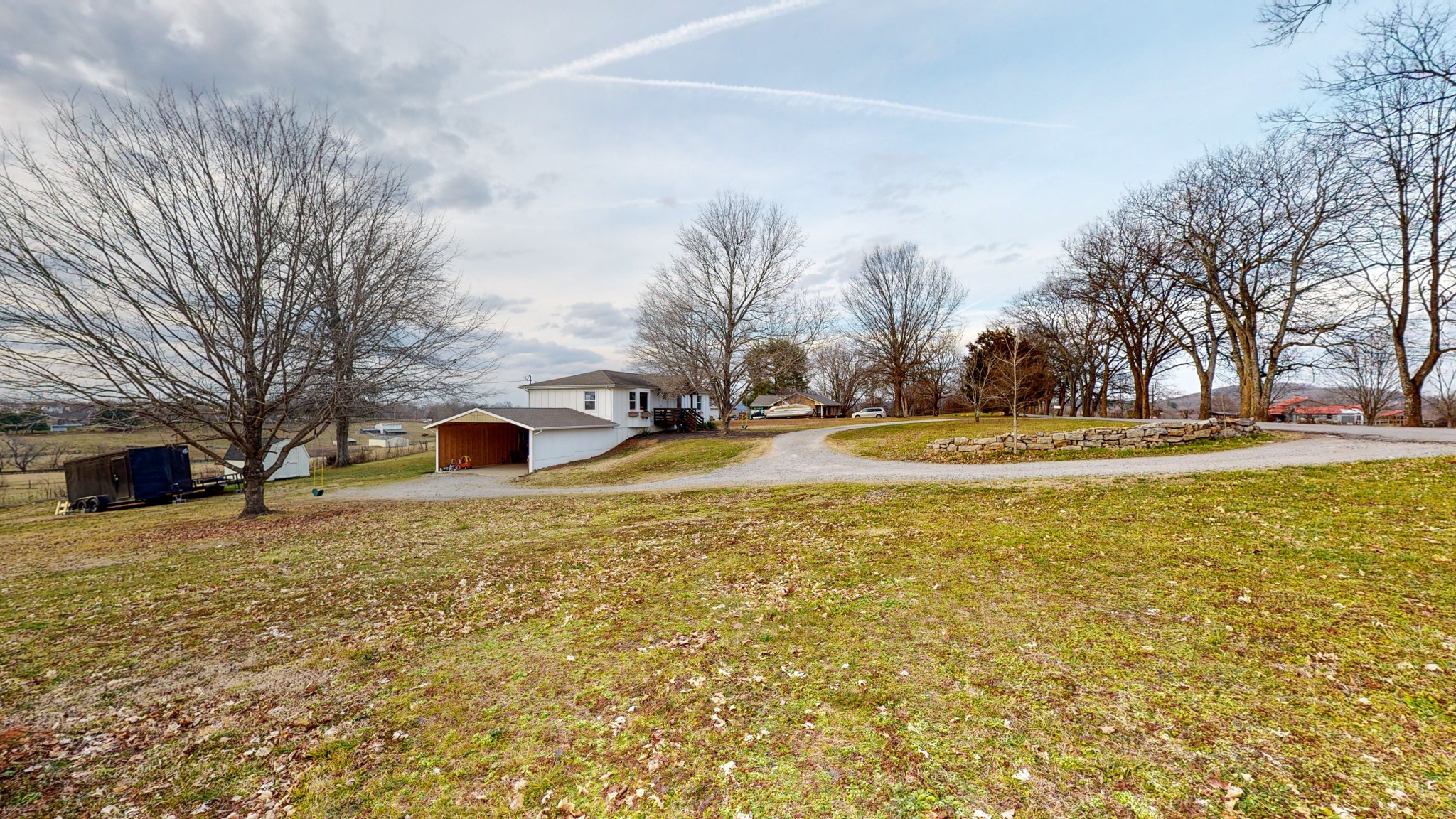 2615 Baugh Road Thompson's Station, TN 37179 - Photo 40 of 60 a front view of a house with a yard and trees
