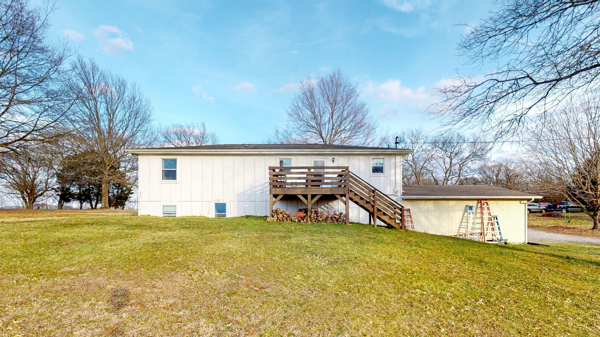 2615 Baugh Road Thompson's Station, TN 37179 - Photo 50 of 60 a view of a house with a yard and garage