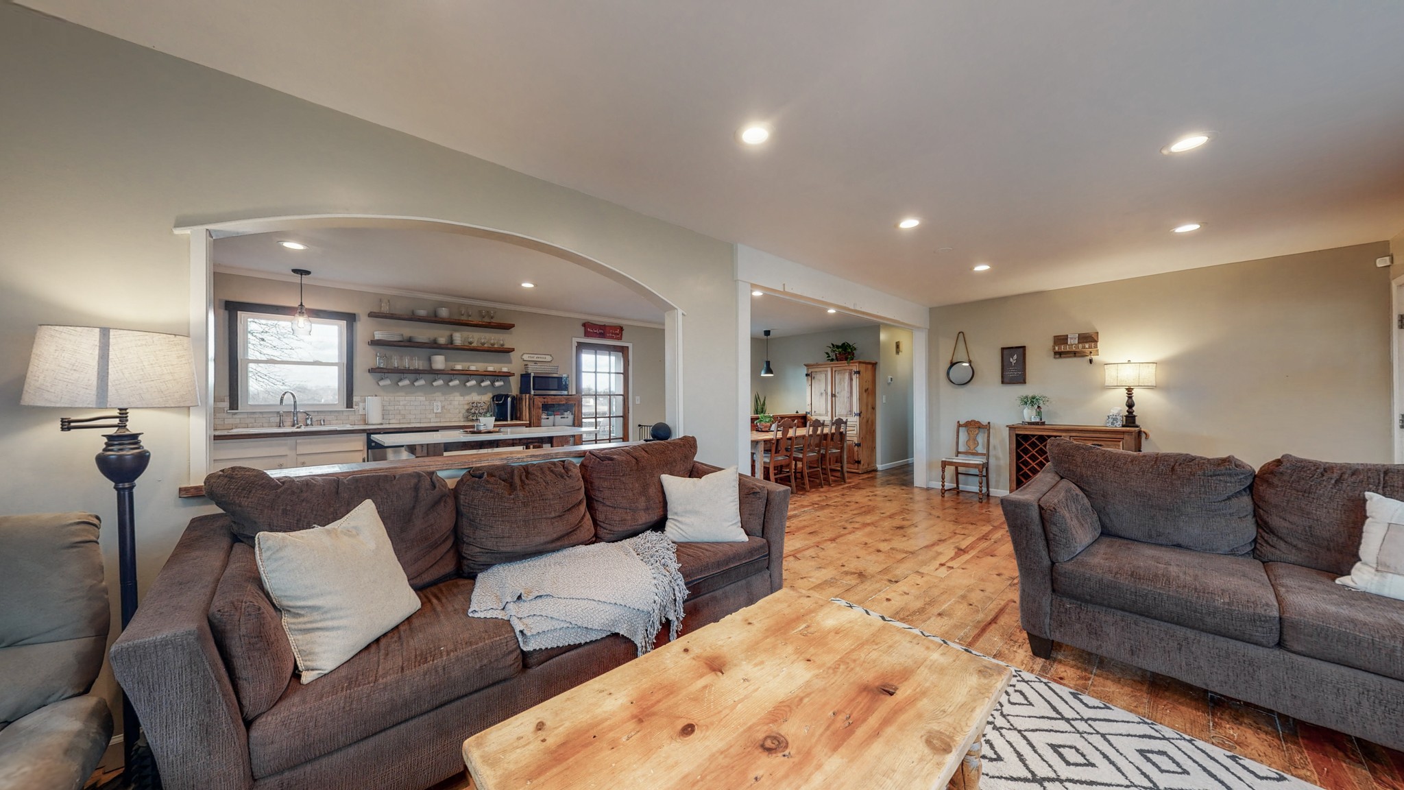 2615 Baugh Road Thompson's Station, TN 37179 - Photo 6 of 60 a living room with furniture and a view of kitchen