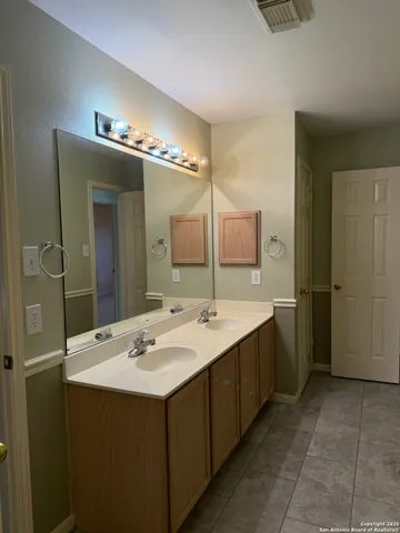 a bathroom with a toilet and a tub