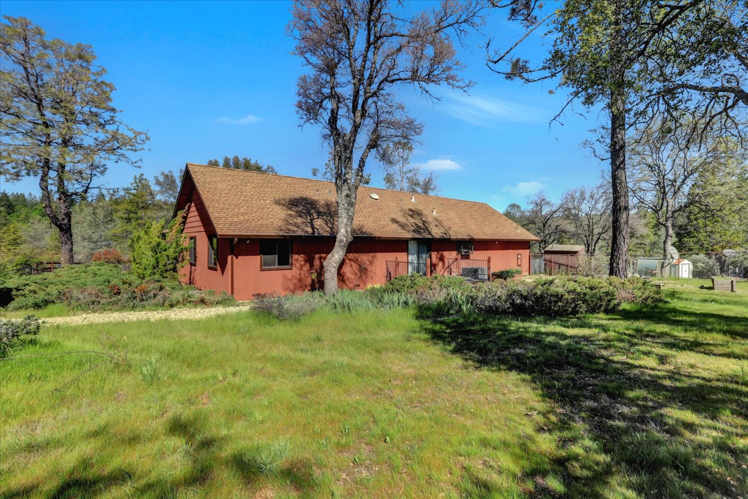 10265 Newtown Road Nevada City, CA 95959 - Photo 29 of 35 a view of a house with a yard