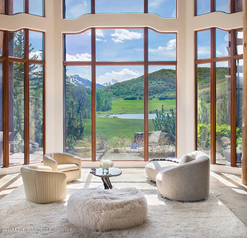 a living room with couch and a window