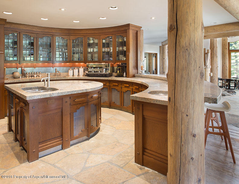 1500 Owl Creek Ranch Road Aspen, CO 81611 - Photo 11 of 18 a kitchen with a sink stove and cabinets
