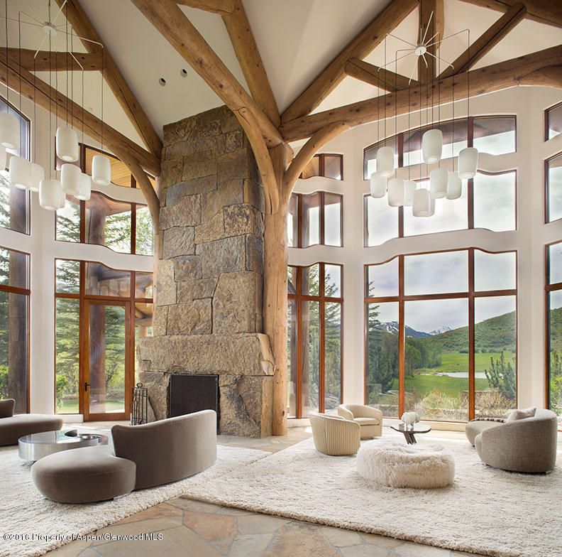 1500 Owl Creek Ranch Road Aspen, CO 81611 - Photo 12 of 18 a living room with furniture and large windows