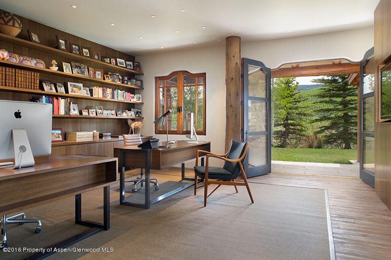 1500 Owl Creek Ranch Road Aspen, CO 81611 - Photo 5 of 18 a workspace with furniture and a bookshelf