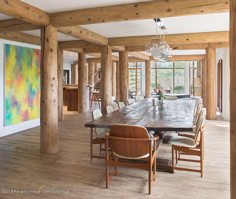 1500 Owl Creek Ranch Road Aspen, CO 81611 - Photo 6 of 18 a dining room with furniture and window