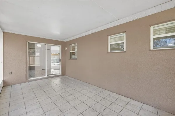 a view of an empty room with window