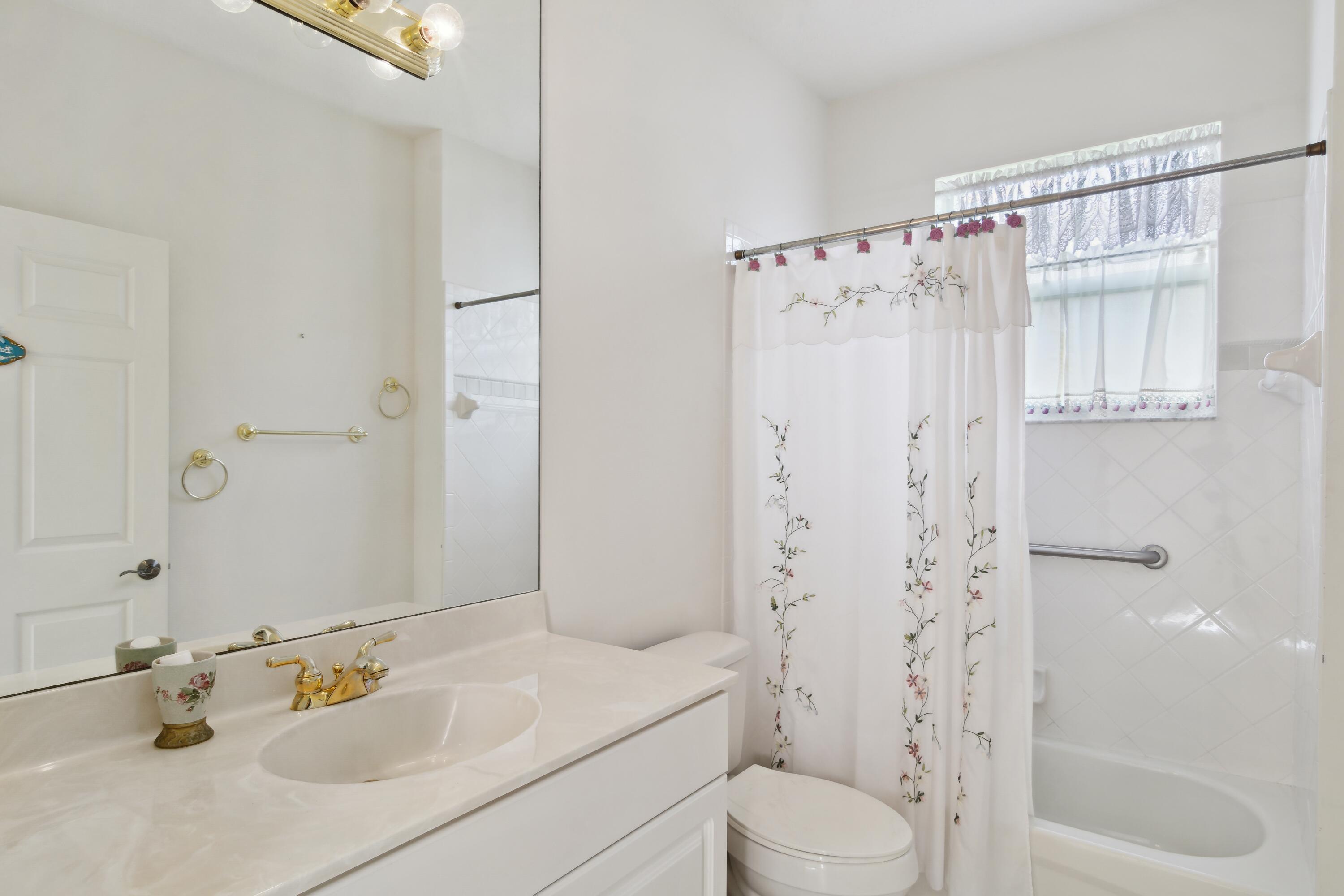 403 Springview Loop Port St. Lucie, FL 34986 - Photo 12 of 52 12_403NWSpringviewLoop_8_Bathroom_HiRes