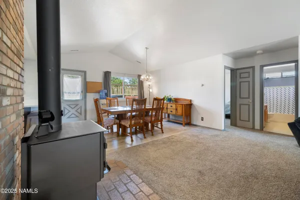 a view of a livingroom with furniture and window