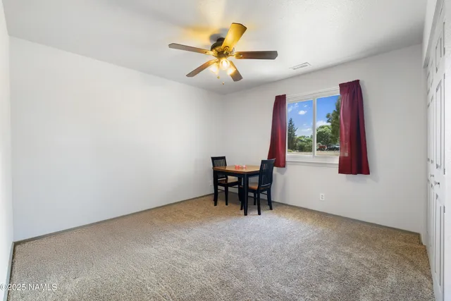 a bathroom with a sink toilet and a mirror