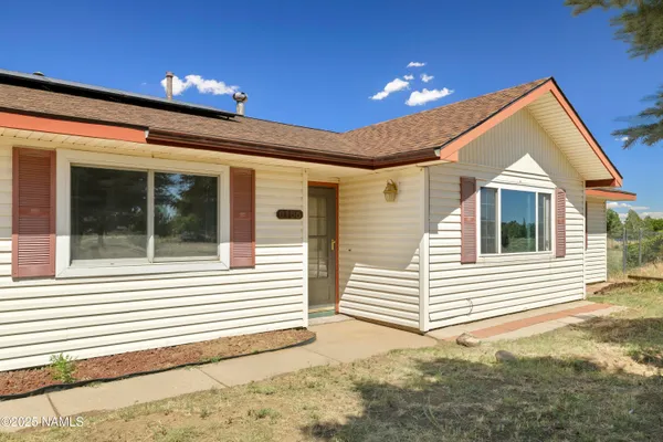 a view of a house with a patio