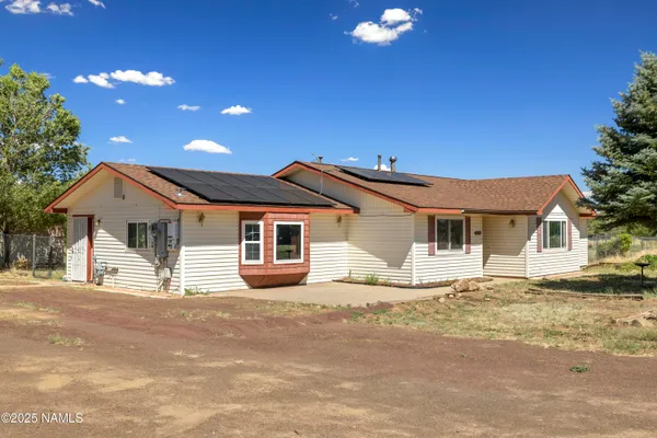 a house view with a outdoor space