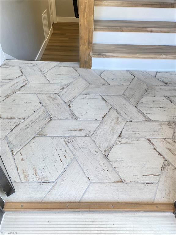 5811 Moravia Road Winston-Salem, NC 27127 - Photo 36 of 40 Italian porcelain basket weave design flooring in entryway