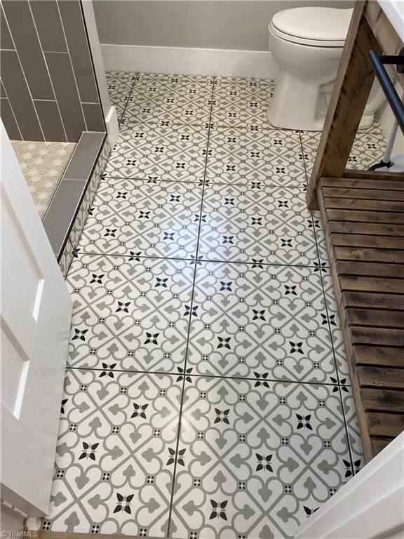 5811 Moravia Road Winston-Salem, NC 27127 - Photo 38 of 40 All 3 bathrooms with brand new hand laid porcelain/ceramic tile