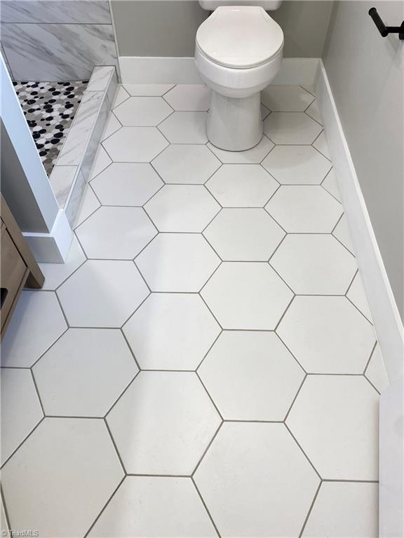 5811 Moravia Road Winston-Salem, NC 27127 - Photo 40 of 40 All 3 bathrooms with brand new hand laid porcelain/ceramic tile