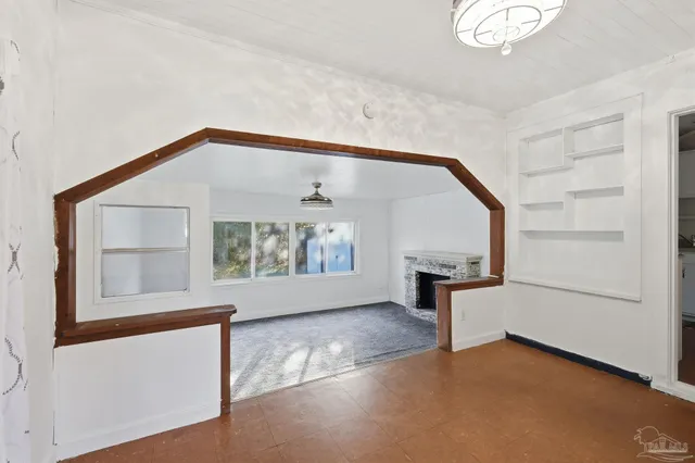 a view of empty room with front door