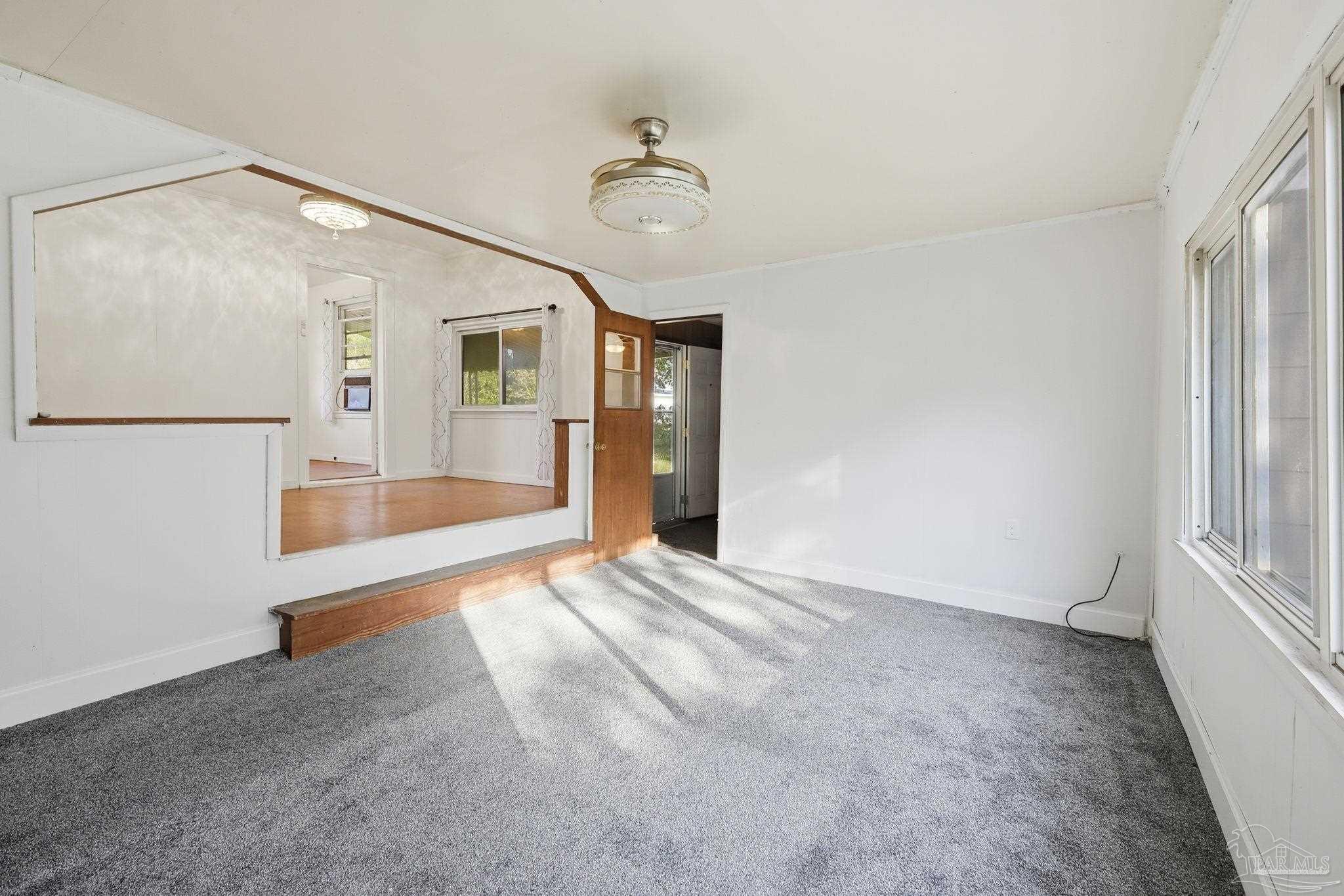 525 Pelham Road Pensacola, FL 32507 - Photo 13 of 28 a view of an empty room with a window