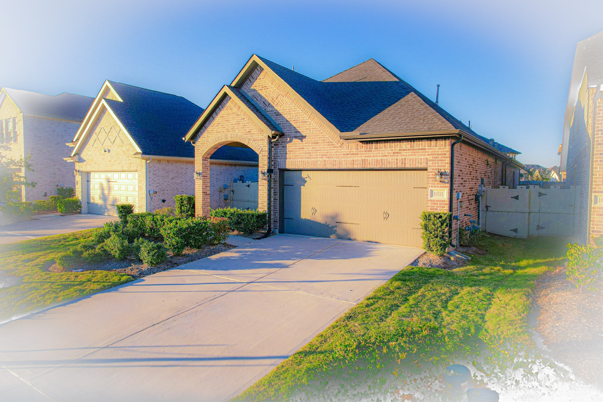 10533 Wild Chives Conroe, TX 77385 - Photo 4 of 36 a view of front of house with a yard