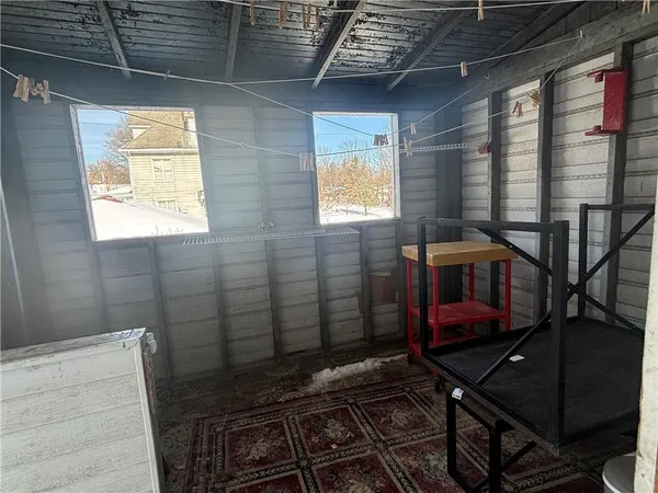 a bathroom with a small window