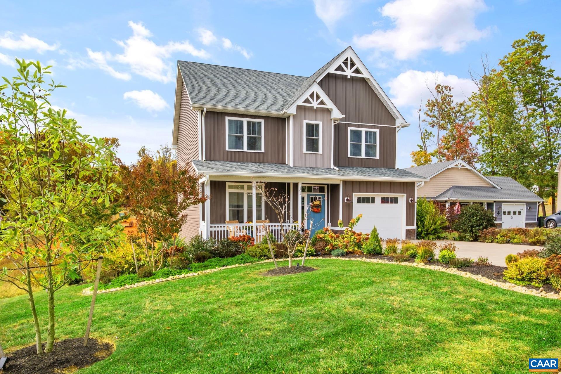 103 Oakstone Run Staunton, VA 24401 - Photo 3 of 42 a front view of a house with garden