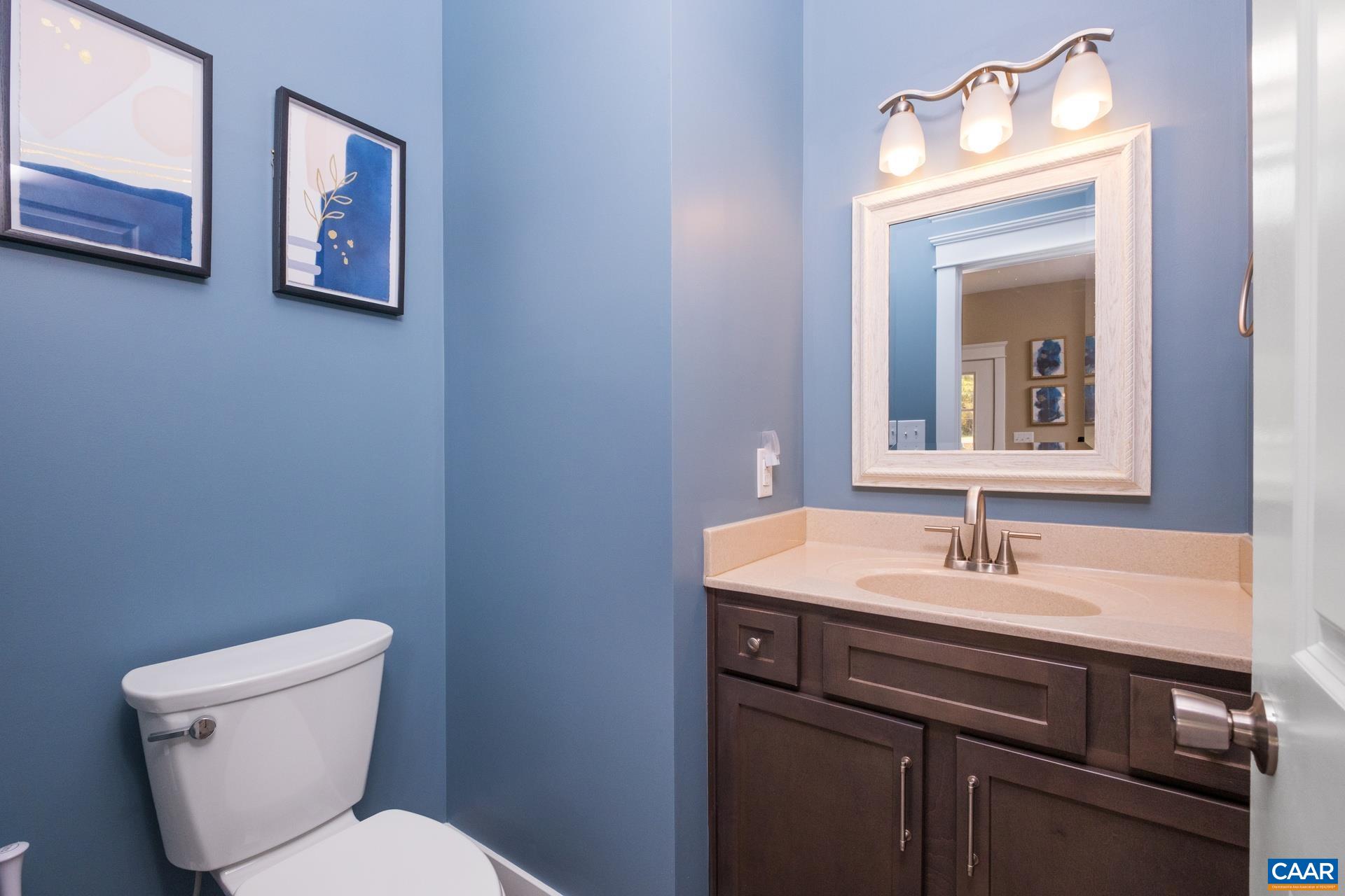 103 Oakstone Run Staunton, VA 24401 - Photo 41 of 42 a bathroom with a toilet sink and mirror