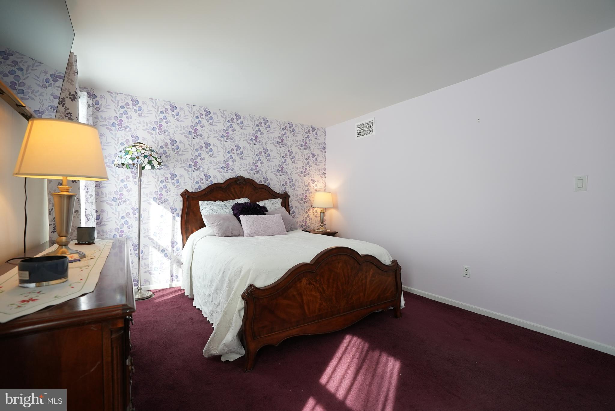 18 Cobblestone Court Sicklerville, NJ 08081 - Photo 27 of 56 a bedroom with a bed and a lamp on dresser