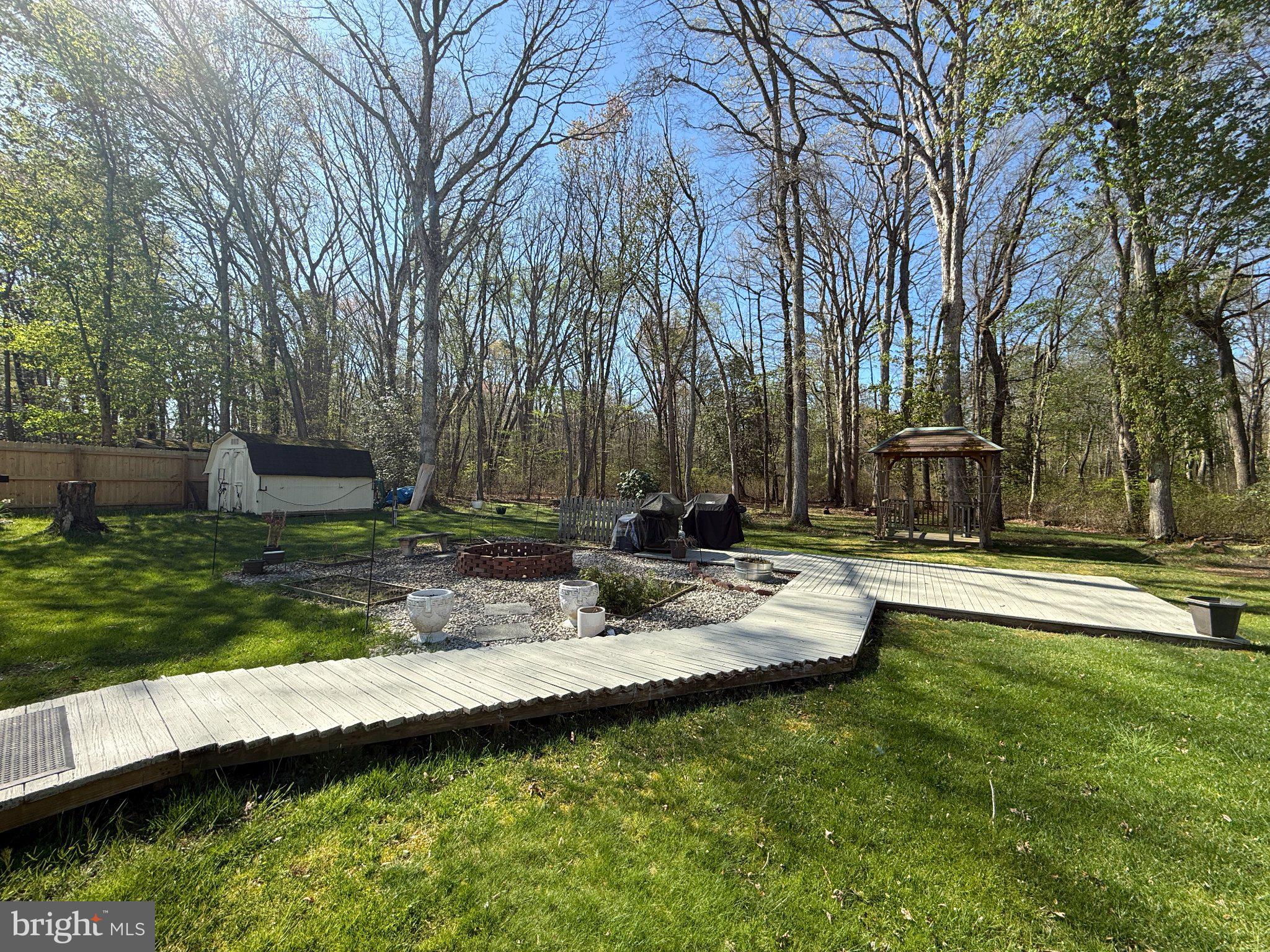 18 Cobblestone Court Sicklerville, NJ 08081 - Photo 47 of 56 a view of a garden with large tree