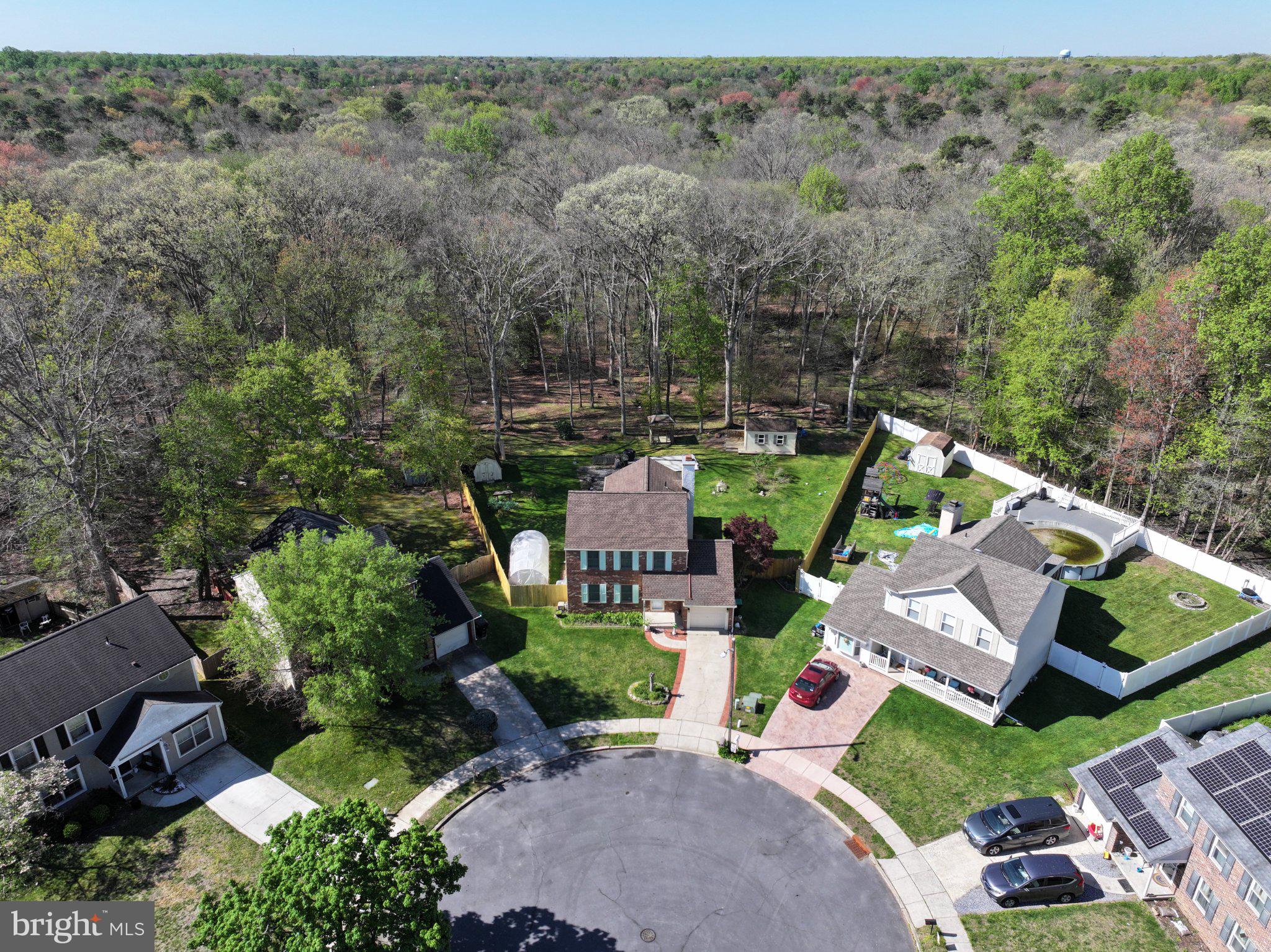 18 Cobblestone Court Sicklerville, NJ 08081 - Photo 55 of 56 an aerial view of a house with lots of trees