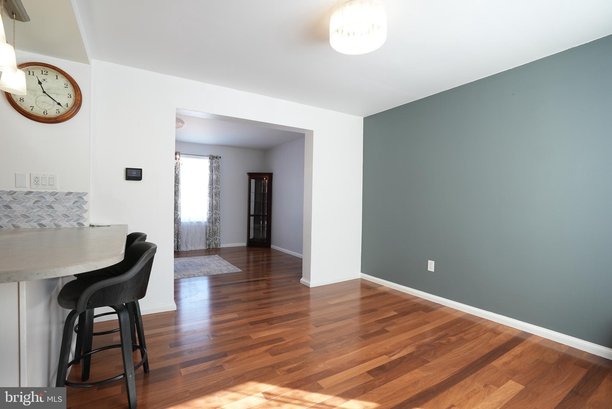 18 Cobblestone Court Sicklerville, NJ 08081 - Photo 7 of 56 a view of a room with furniture and wooden floor