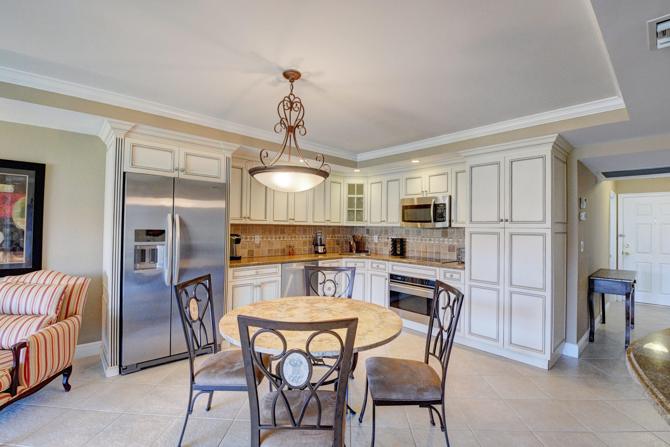 2871 North Ocean Boulevard, Unit D304 Boca Raton, FL 33431 - Photo 1 of 28 Kitchen Dining Area