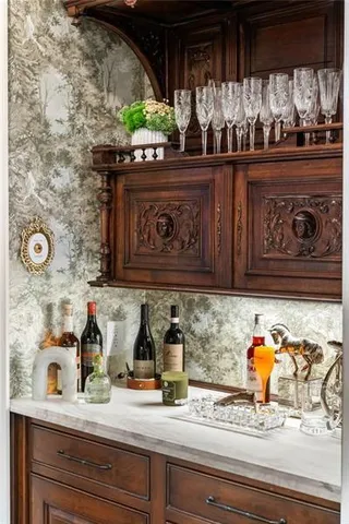 a bathroom with a sink a mirror and a shower