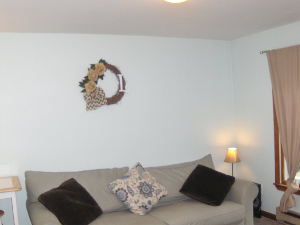 65 North Sturbridge Road Charlton, MA 01507 - Photo 7 of 30 a bedroom with a bed and a couch