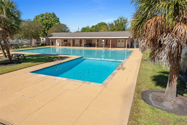 a view of a house with a swimming pool