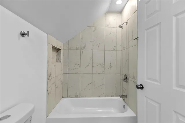 a bathroom with a bathtub