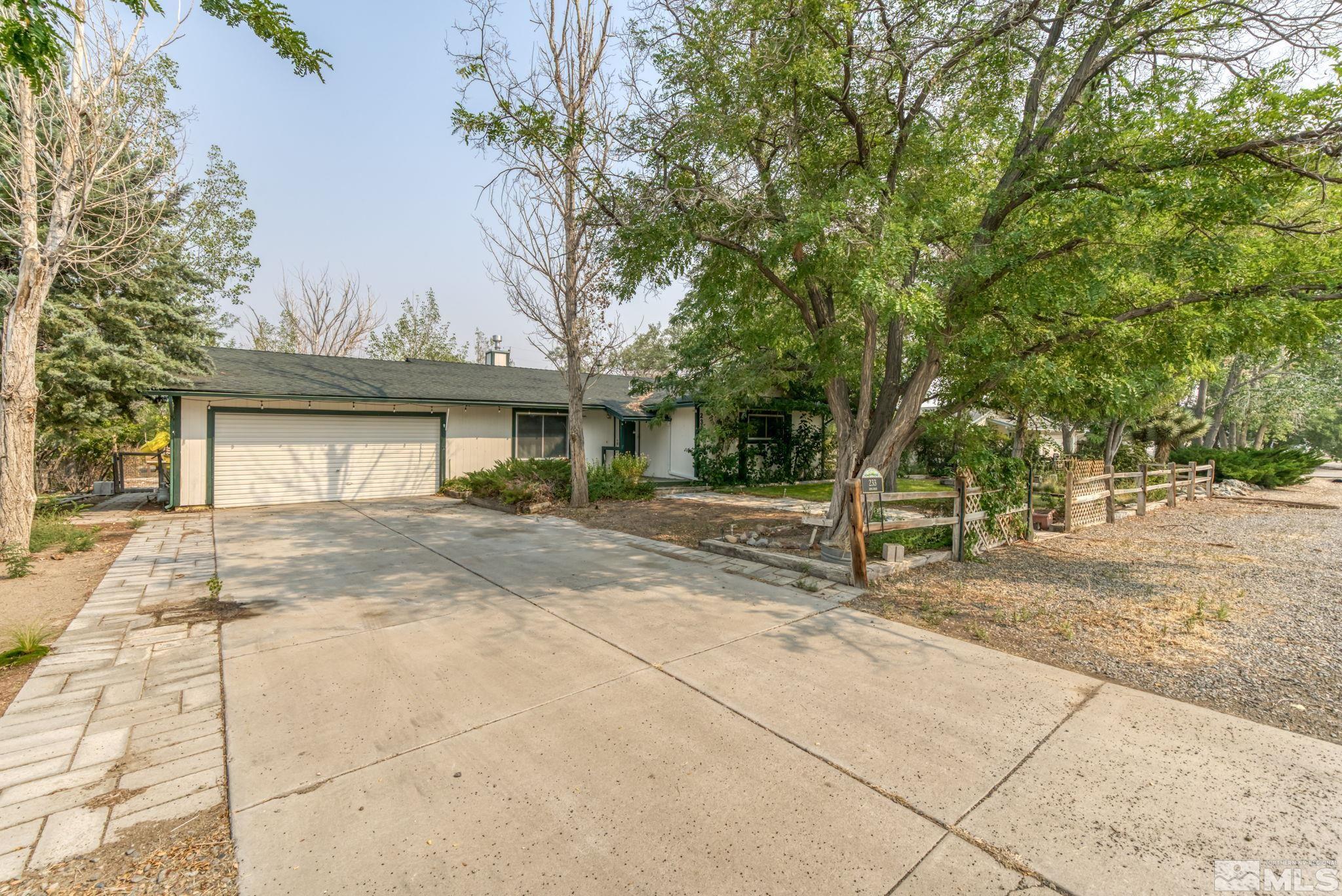 233 Ring Road Dayton, NV 89403 - Photo 3 of 39 a view of a house with a garden