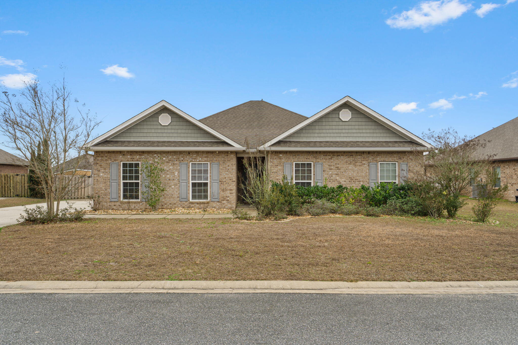 523 Gadwell Street Crestview, FL 32539 - Photo 2 of 28 a front view of a house with a yard