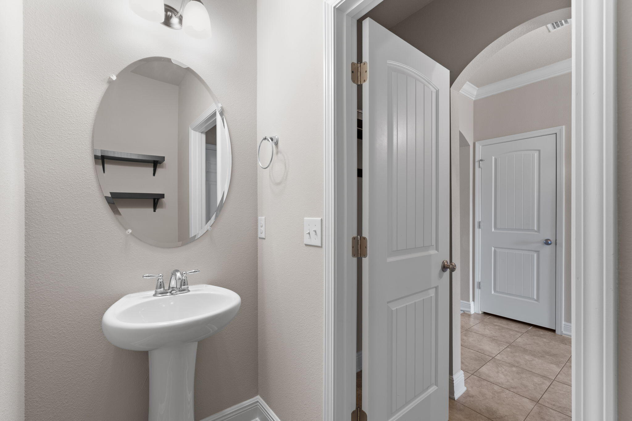 523 Gadwell Street Crestview, FL 32539 - Photo 23 of 28 a bathroom with a sink and a mirror