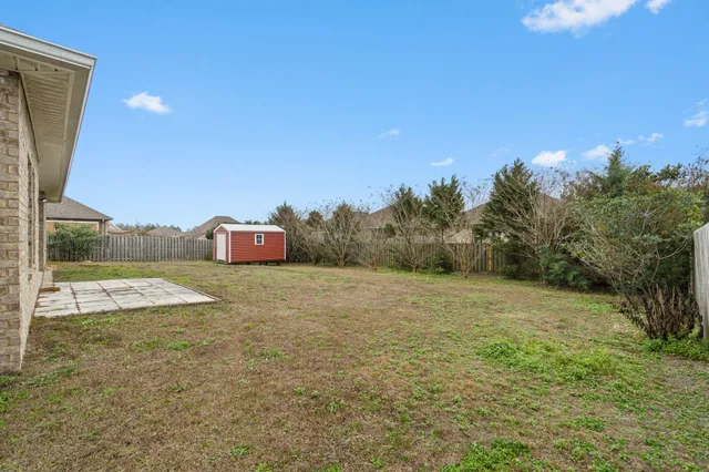 a swimming pool with a yard