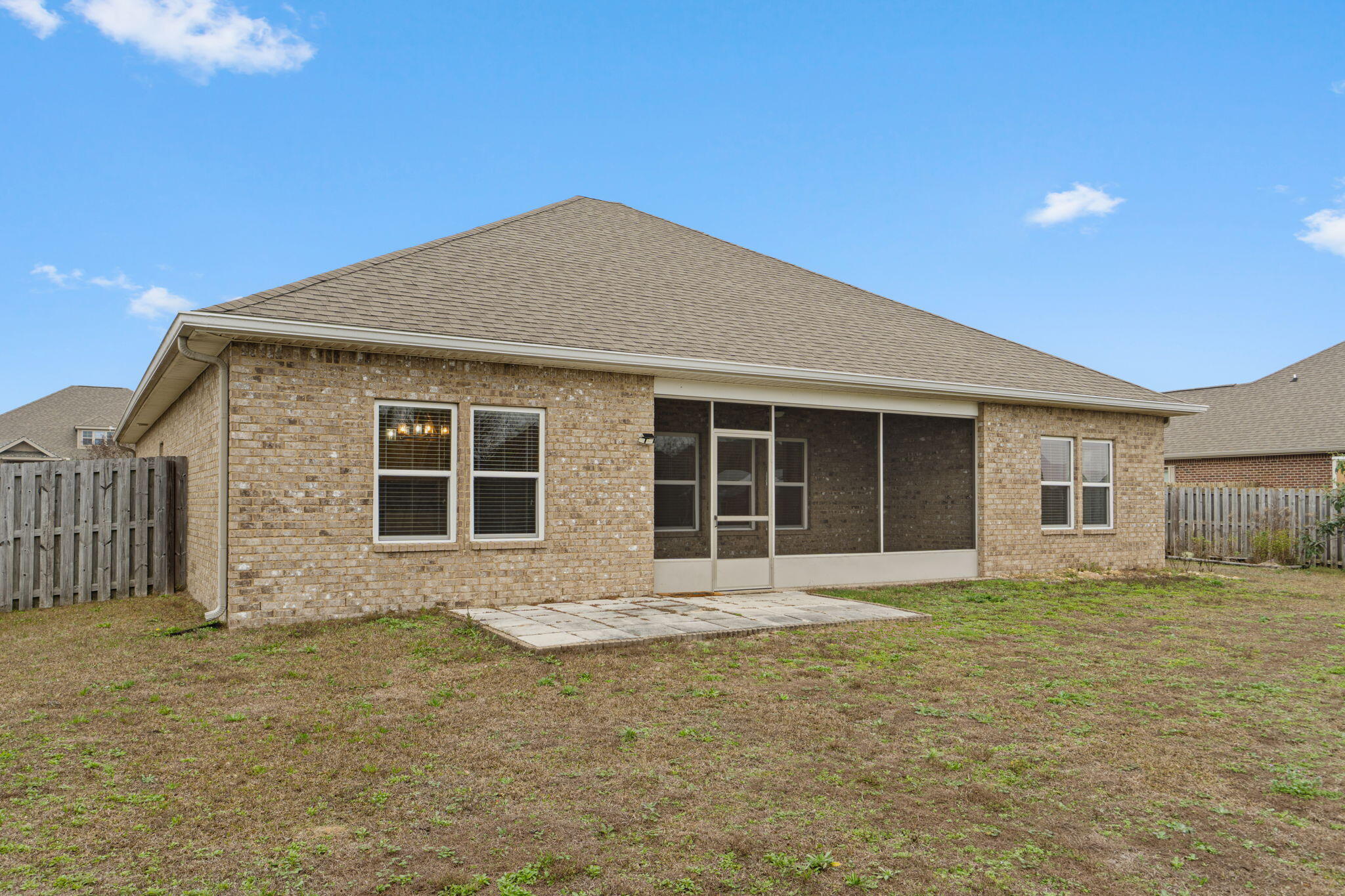 523 Gadwell Street Crestview, FL 32539 - Photo 27 of 28 a front view of a house with a garden