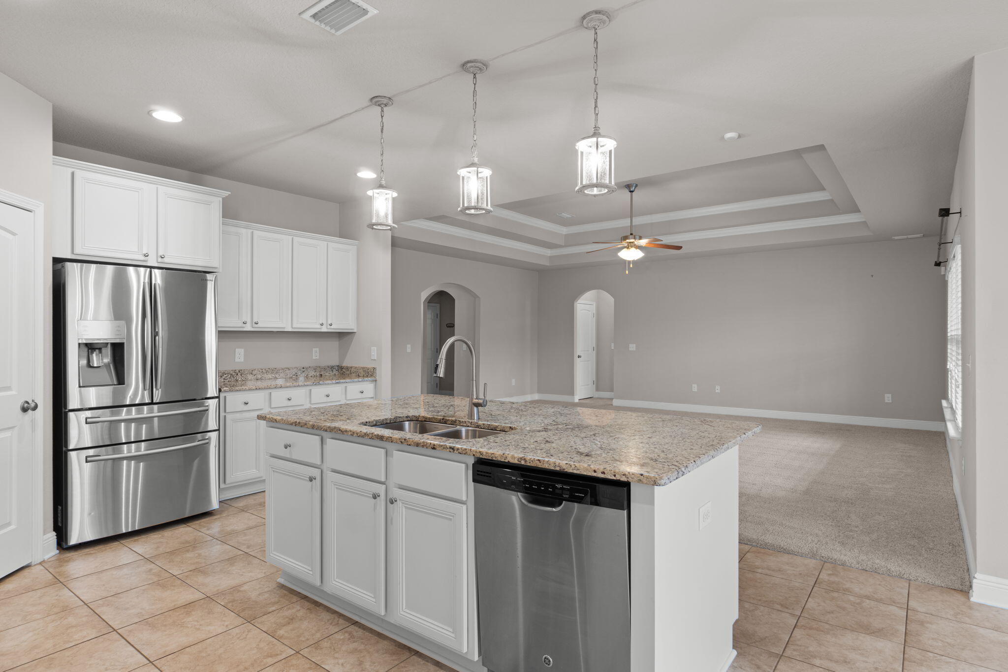523 Gadwell Street Crestview, FL 32539 - Photo 9 of 28 a kitchen with a refrigerator a sink and a refrigerator