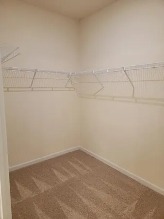 a view of a room with racks on the wall