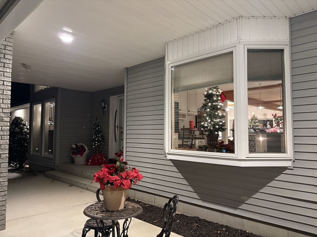 321 Westerly Circle Ludlow, MA 01056 - Photo 11 of 38 a view of a porch with a chair