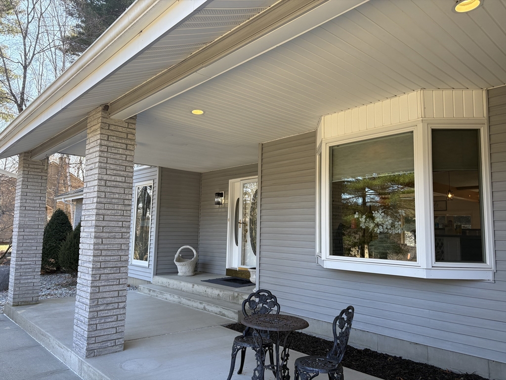 321 Westerly Circle Ludlow, MA 01056 - Photo 15 of 38 a front view of a house with a porch