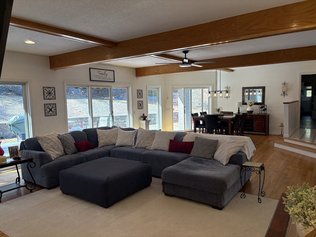 321 Westerly Circle Ludlow, MA 01056 - Photo 17 of 38 a living room with furniture and a large window