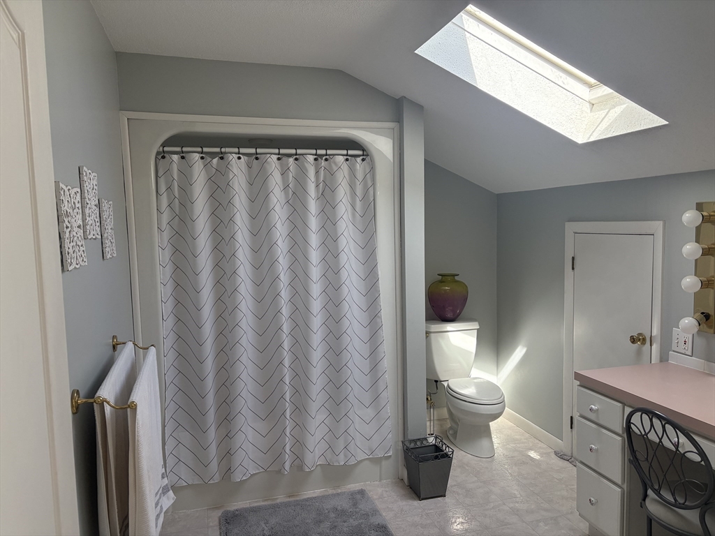 321 Westerly Circle Ludlow, MA 01056 - Photo 26 of 38 a bathroom with a sink and a toilet