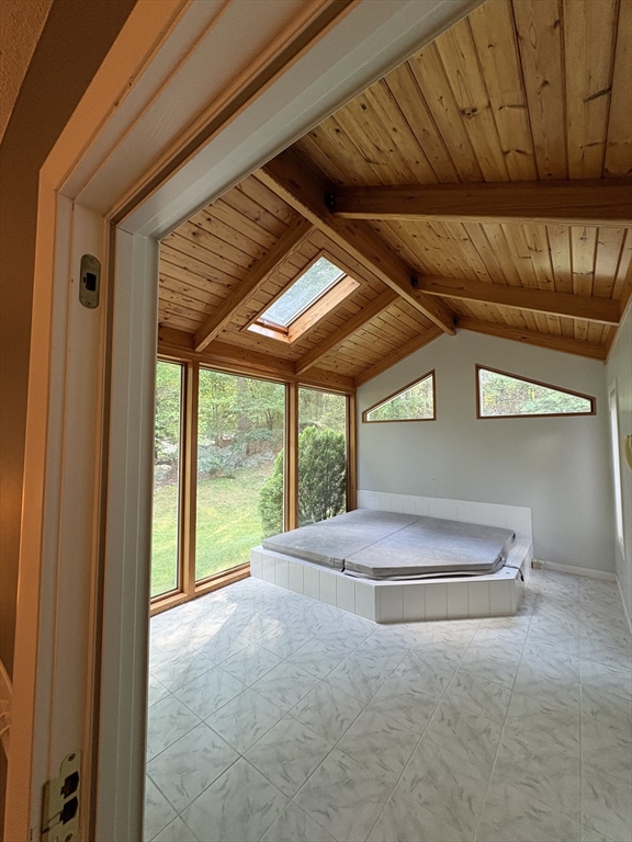 321 Westerly Circle Ludlow, MA 01056 - Photo 33 of 38 a view of livingroom with furniture and floor to ceiling window
